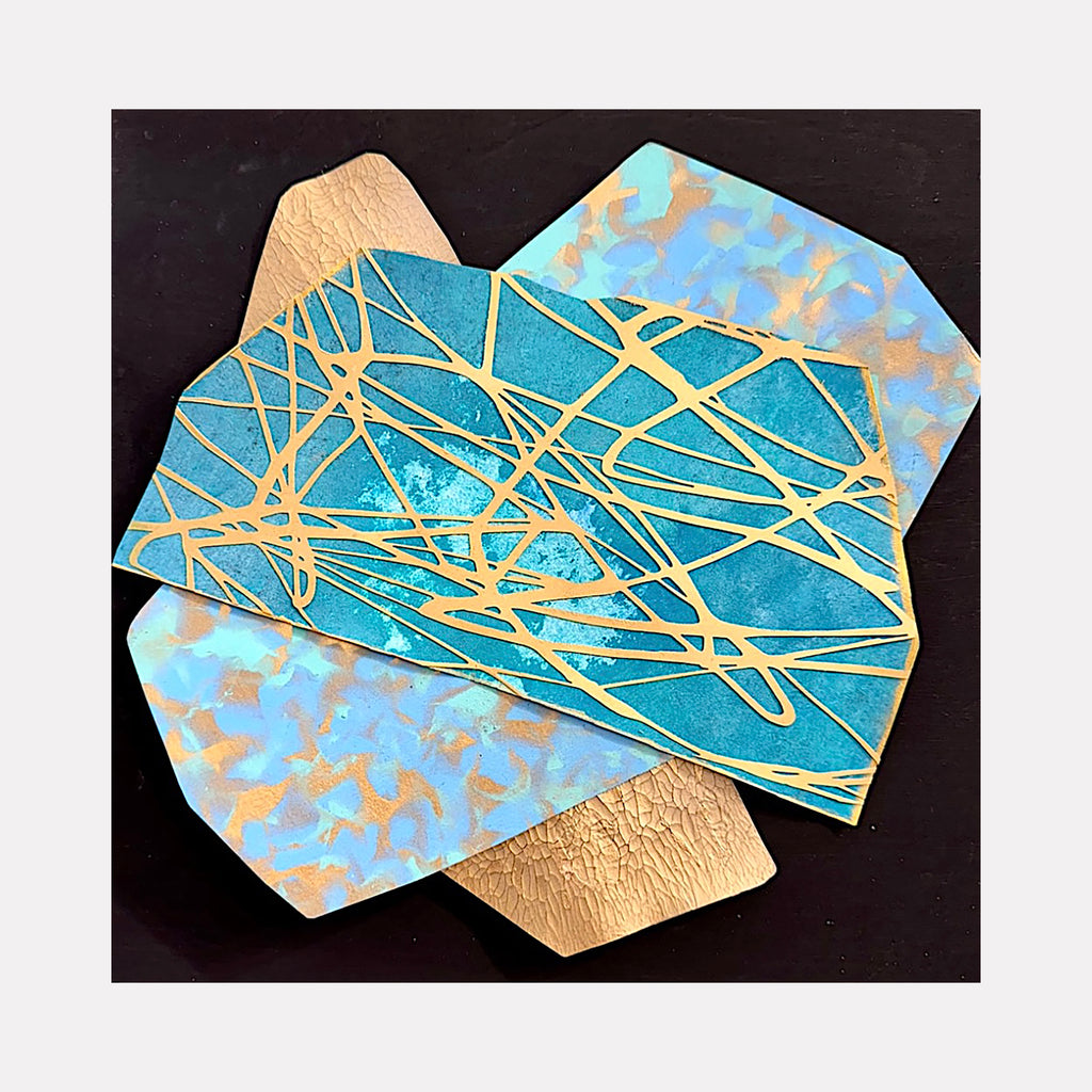 Abstract Collage I by Nicole Hitchcock features a modern geometric composition with intersecting golden lines creating a web-like pattern over vibrant turquoise sections. Metallic gold accents and textural elements combine with resin finish, creating depth and dimension in this 12x12 inch mixed media artwork.