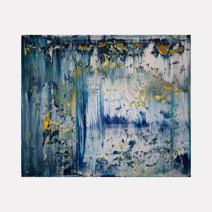 The artwork 'Abstract Indigo 1' by Harry Moody features dramatic vertical brushstrokes in deep indigo blue and white, with accents of golden yellow throughout. The textural oil painting creates a sense of cascading water or rain, with layered paint techniques creating depth and movement across the 24x20 inch canvas.