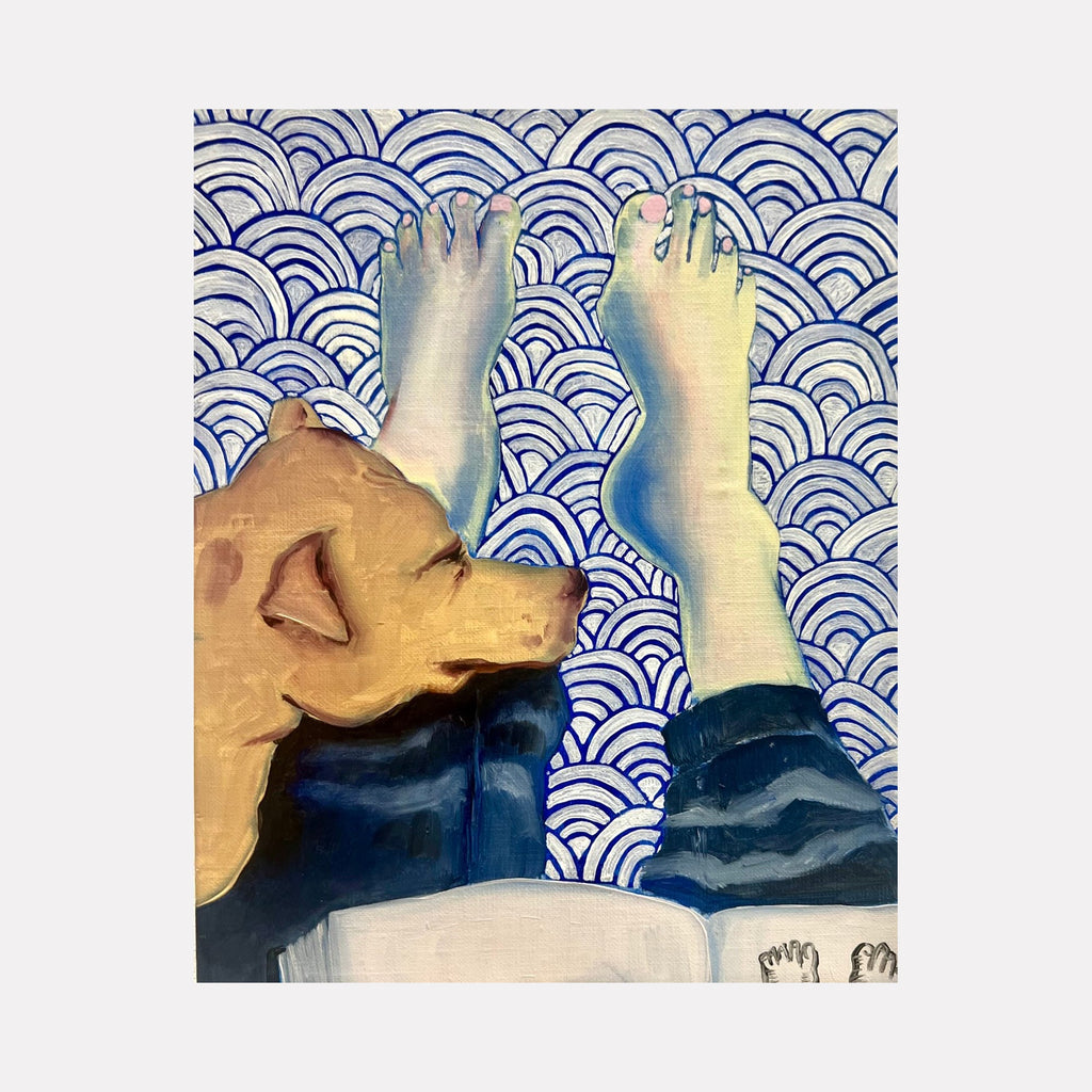 The artwork 'Artemis in Repose' features bare feet against a traditional Japanese seigaiha wave pattern background in cobalt blue and white. The oil painting captures a reclining pose with warm flesh tones contrasting against the geometric repeated pattern, painted with delicate brushwork on linen by Monica Carrier.