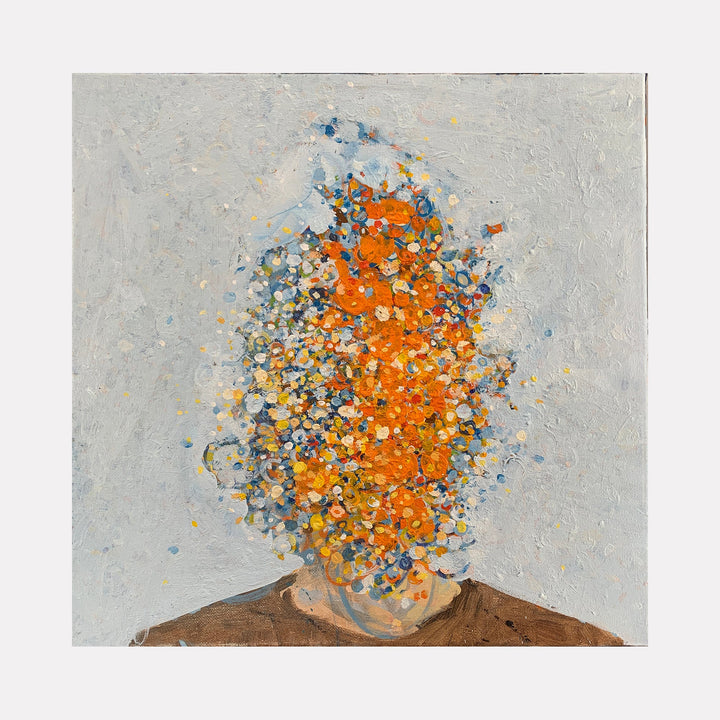 The artwork 'Bubbling' by Matthew Cramer features an abstract explosion of vibrant orange, blue, and yellow dots against a light gray background. The paint particles appear to burst upward in a dynamic, cloud-like formation, creating a textured effect through impasto oil technique on canvas, set above a earthy brown base.