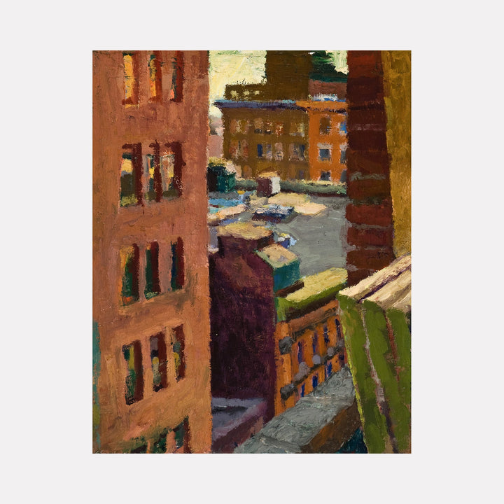 The artwork 'Cityscape with Yellow Sky' by Marianne Barcellona depicts an urban scene with rust-colored brick buildings, featuring rows of dark windows. A narrow alley or pathway leads between structures, with glimpses of distant buildings in muted oranges and browns. The oil painting captures an intimate city perspective with warm tones and textured brushwork on canvas, showcasing architectural elements and urban shadows.