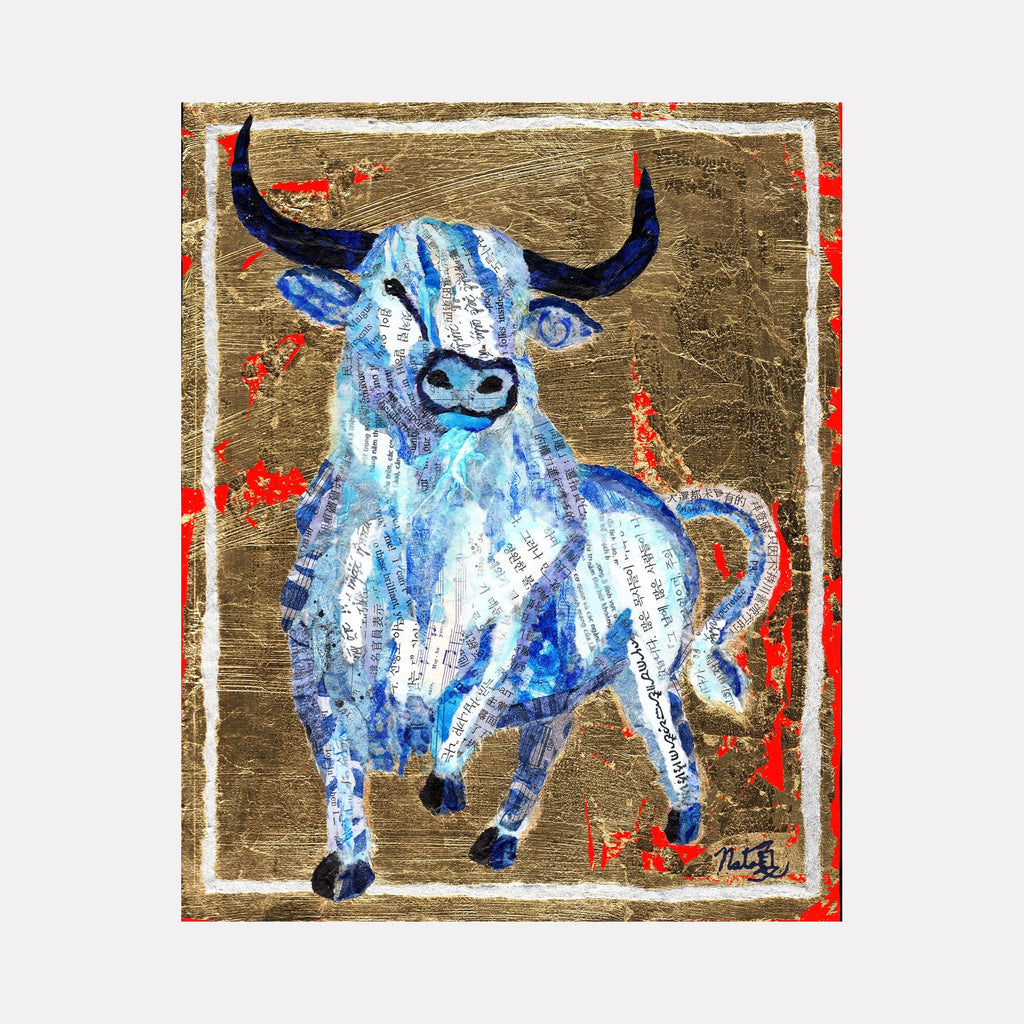 The artwork 'Confidence' by Natasha Papousek features a bold blue bull rendered in mixed media against a metallic gold background. The dynamic composition shows a powerful bull with distinctive horns, textured with collage elements and energetic brushstrokes. Vibrant coral red accents frame the subject, while a white border adds definition. 10x8 inches.