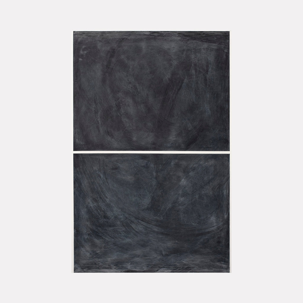 The artwork 'Erasure 37' by Erika Mahr features two stacked rectangular panels in deep charcoal tones, created with mixed media including charcoal, paint, and graphite on dura-lar. The abstract composition showcases sweeping gestural marks and layered textures, creating a moody atmospheric effect in varying shades of black and gray.