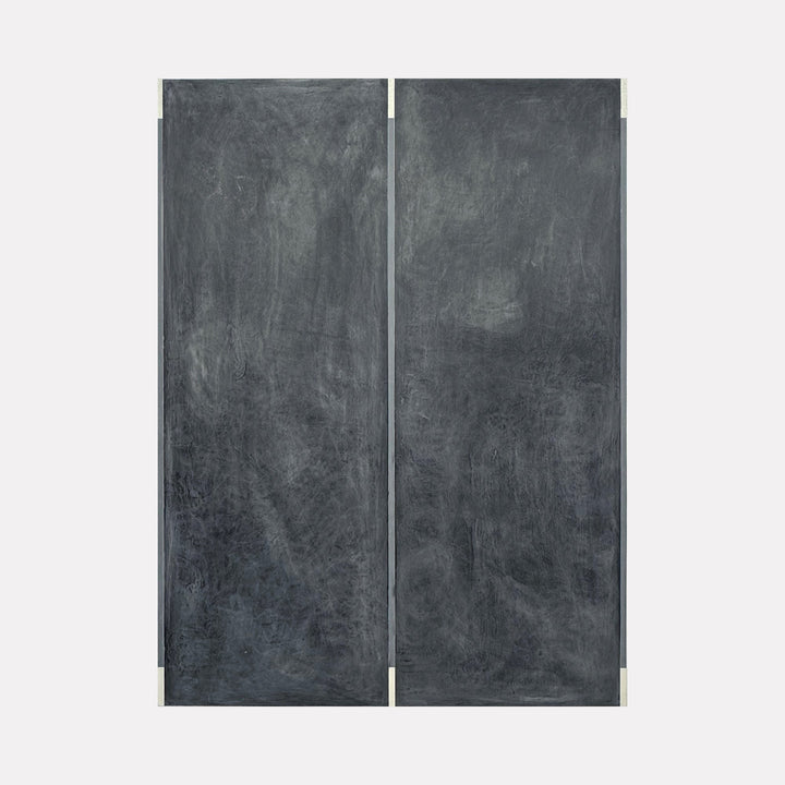 The artwork 'Erasure 47' by Erika Mahr features a diptych composition in deep charcoal tones, with textural scratches and ethereal markings across two vertical panels. The surface shows a moody, weathered appearance created through layered charcoal, paint, and graphite on dura-lar, mounted on panel.