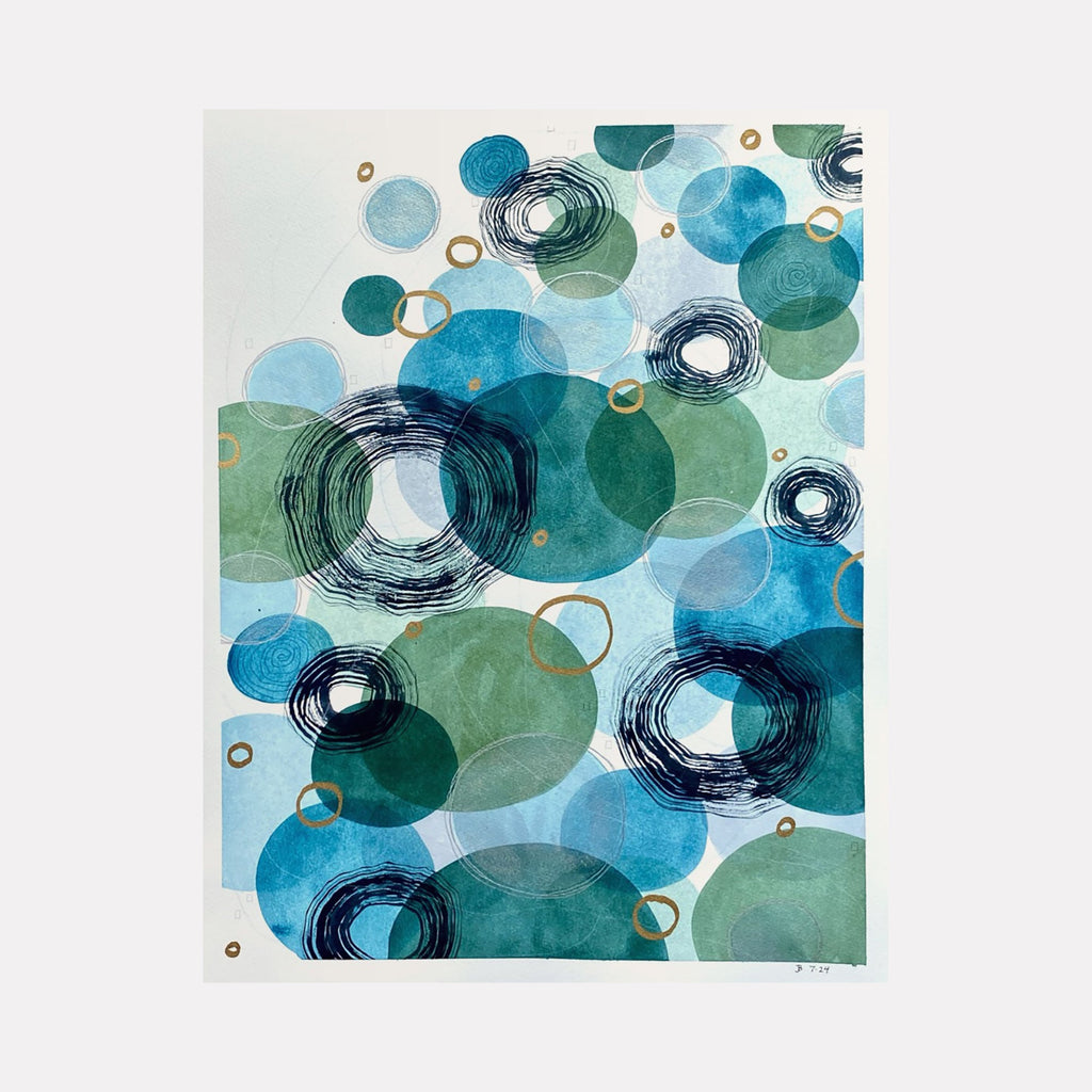 The artwork 'Merciful Depths' by Jocelyn Benford features overlapping translucent circles in aqua, teal, and seafoam green, with spiral black ink details. Abstract watercolor bubbles float across white paper, creating a dreamy underwater atmosphere. Gold metallic accents complement the cool-toned palette. Mixed media on paper by Jocelyn Benford.