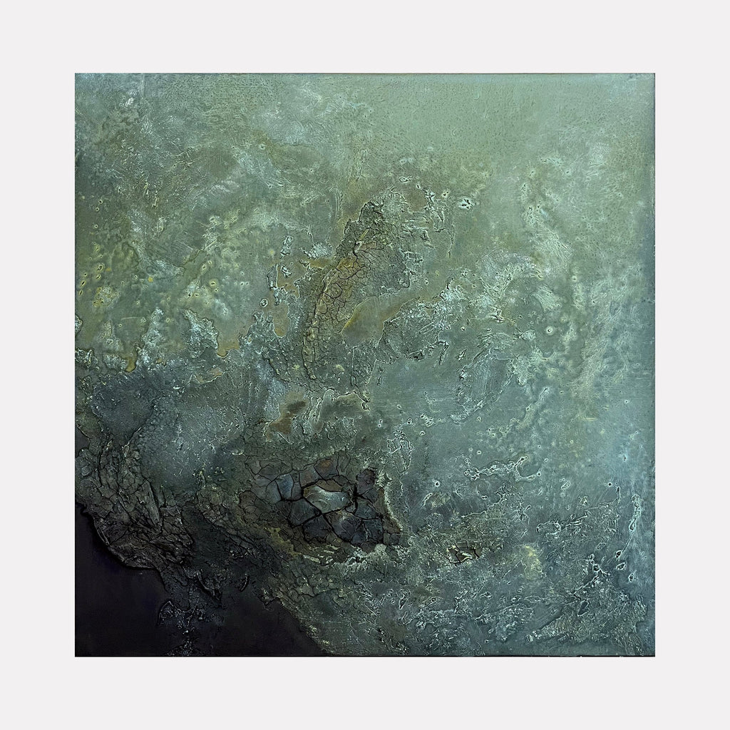 The artwork 'Patient Jeweler' by Abbey Stace features a textured abstract composition in muted green and blue tones. The mixed-media piece combines plaster, acrylic, oil, and sand to create a mystical, underwater-like surface with organic patterns and swirling textures. Dark undertones emerge from lighter, ethereal areas, creating depth and movement throughout the 24-inch square canvas.