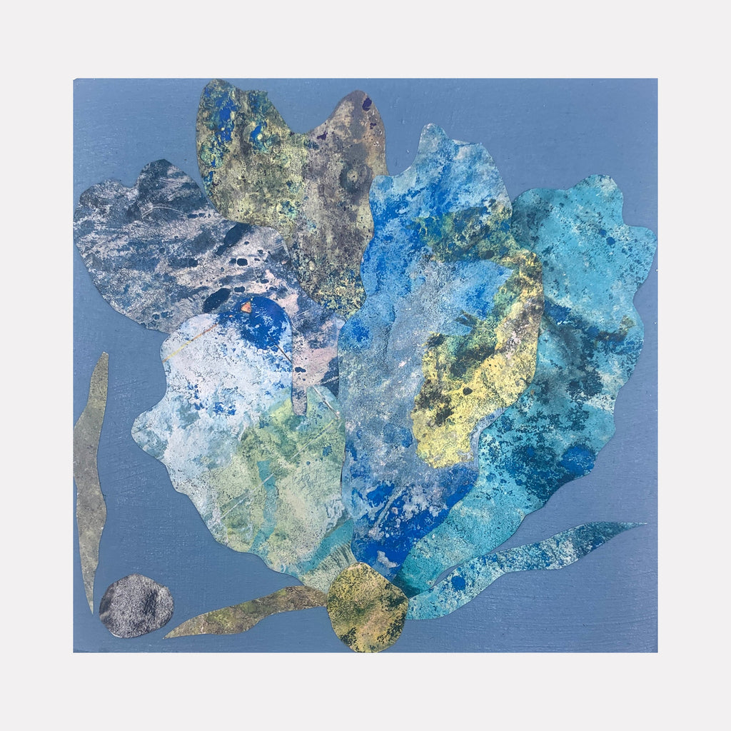 The artwork 'Sea Fan 4' by Sunny Chapman features an abstract marine-inspired composition with layered collage elements in vibrant aquatic hues. Translucent blues, turquoise, and pale yellow blend organically against a serene blue background, creating a delicate coral-like form with textural alchemic prints on wood panel.