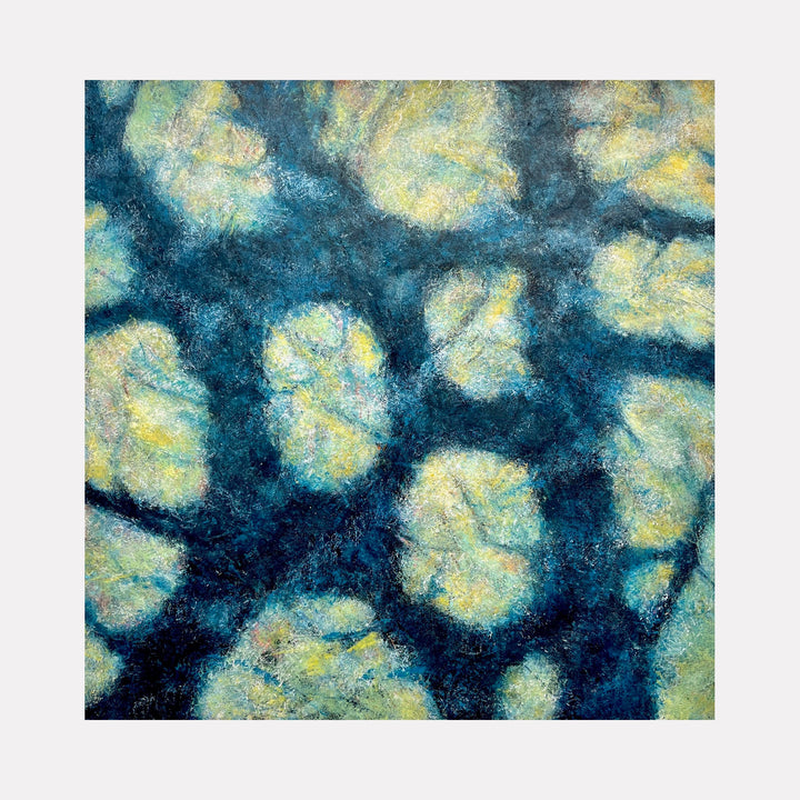 The artwork 'Shadow Play' by Cynthia Sumner features an abstract pattern of luminous yellow-green forms floating against a deep teal background. The mixed media piece creates a mesmerizing tie-dye effect, with organic circular shapes that appear to glow like underwater creatures or distant celestial bodies, showcasing a dynamic interplay of light and shadow across the 36-inch square canvas.