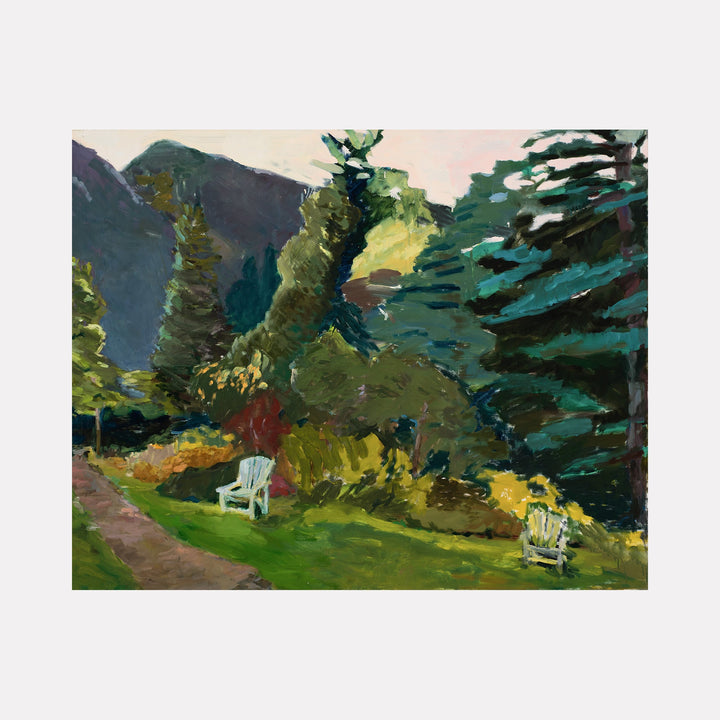 The artwork 'Two Chairs' depicts a serene garden landscape with white Adirondack chairs nestled among lush evergreen trees and mountain backdrop. Oil painting features vibrant greens, deep forest hues, and warm earthy tones, with a winding dirt path leading through the composition. Rich brushwork creates textural depth in foliage. By Marianne Barcellona.