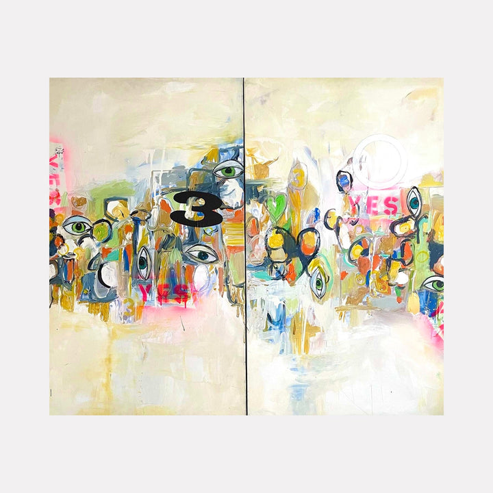 The artwork 'Oh Yes diptych' by Jodi Fuchs features an abstract composition spread across two panels with scattered eye motifs in black and blue, floating amidst vibrant splashes of pink, yellow, and turquoise. The word 'YES' appears in pink, surrounded by organic shapes and gestural brushstrokes on a cream-colored background, creating a whimsical mixed media expression of positivity. By Jodi Fuchs.