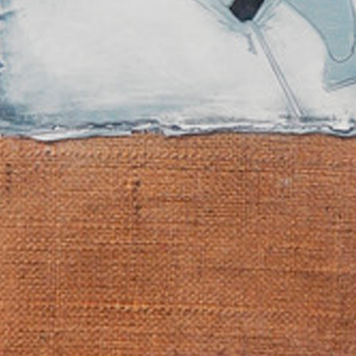 The artwork 'Celebratory Skeptic Dispute' by Evan Peltzman features a minimalist abstract composition with a stark contrast between a textured rust-orange burlap lower section and a cloudy pale blue-white upper region. The plaster creates a natural horizon line, suggesting a landscape with dramatic sky meeting earthy terrain, executed in ink and plaster on burlap and wood panel.