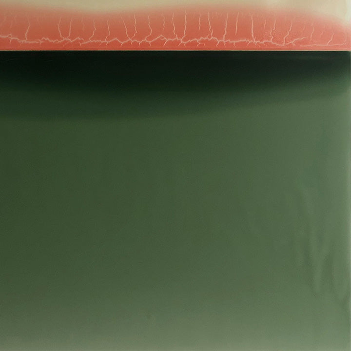 The artwork 'Glance' by Susan English features a minimalist composition with a striking contrast between a coral-pink horizon and deep forest green expanse. The surface exhibits a glossy polymer finish on aluminum, creating subtle variations in texture and depth. Fine, organic crackle patterns traverse the upper section, while the lower portion maintains a smooth, contemplative field.