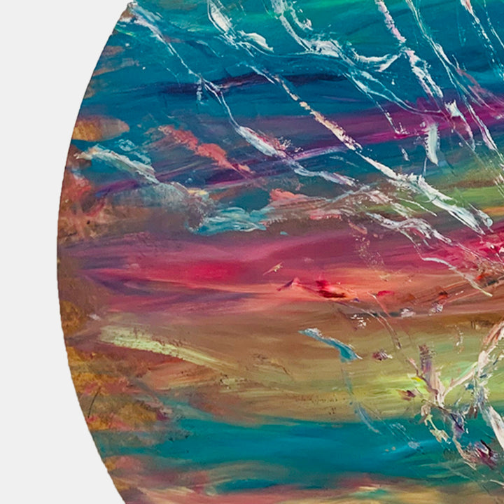 The artwork 'Impressions of Light 1' by Jadie Meprivert features dynamic swirls of vibrant turquoise and coral hues, with abstract patterns resembling fluid motion across a circular wooden canvas. Bold brushstrokes create textural depth, while metallic accents catch light, creating a striking interplay of colors reminiscent of natural phenomena.