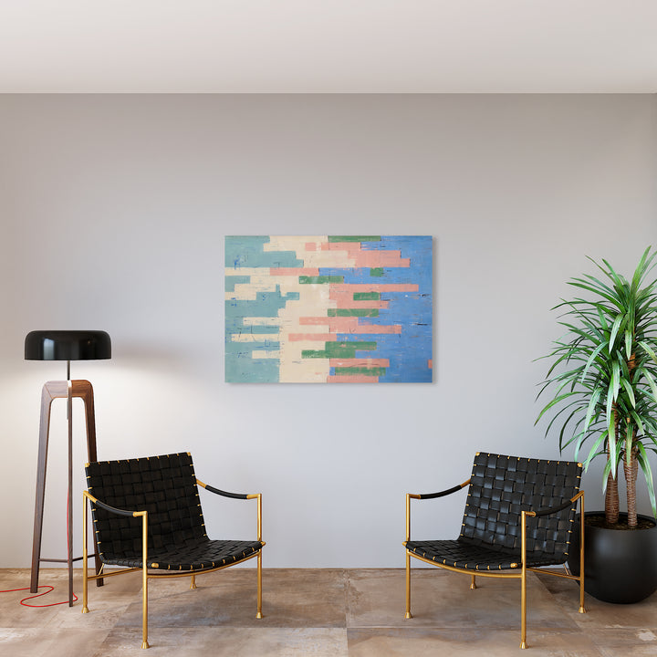 The artwork 'Integration' by Shira Toren features abstract horizontal blocks in soft pastel hues of blue, peach, and sage green. The Venetian plaster pigment on canvas creates a textural, layered effect reminiscent of a fragmented landscape or digital glitch pattern. The 36x48 inch composition balances geometric shapes with subtle color transitions, creating a harmonious modern aesthetic.