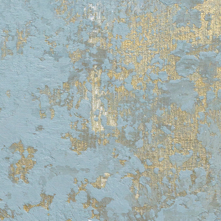 The artwork 'Interference I' features a distressed, textural composition with pale blue-gray background adorned with scattered metallic gold accents. The abstract pattern creates a weathered, vintage effect resembling aged plaster or patinated metal. Created with acrylic and iridescent pigment on birch panel, this 6x6 inch piece showcases an ethereal interplay of colors and textures. By Curina.