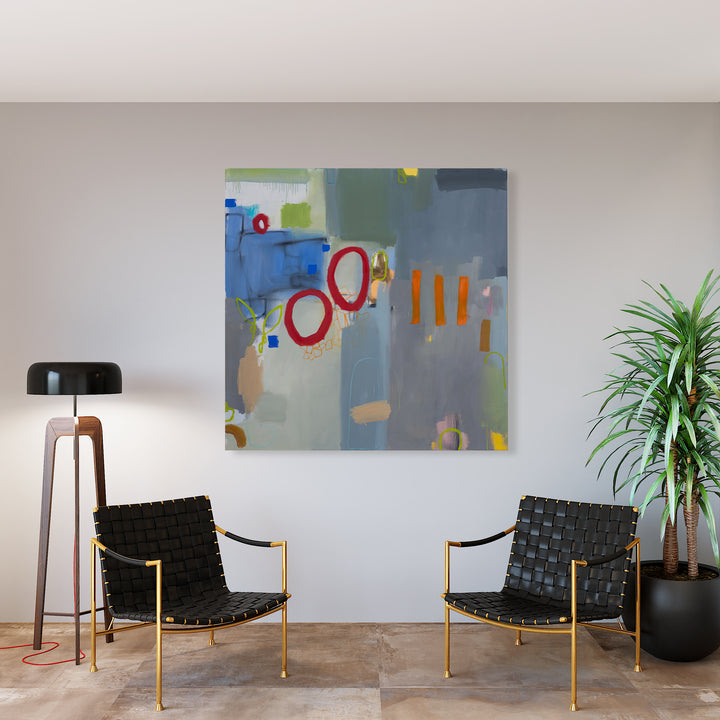 The artwork 'March' by Janice La Motta features an abstract composition with bold red circular forms and orange vertical stripes against a muted grey-blue background. The canvas showcases a dynamic interplay of geometric shapes, gestural brushstrokes, and color blocks in oil and oil pastel, creating a harmonious modern aesthetic on a 60x60 inch canvas by Janice La Motta.