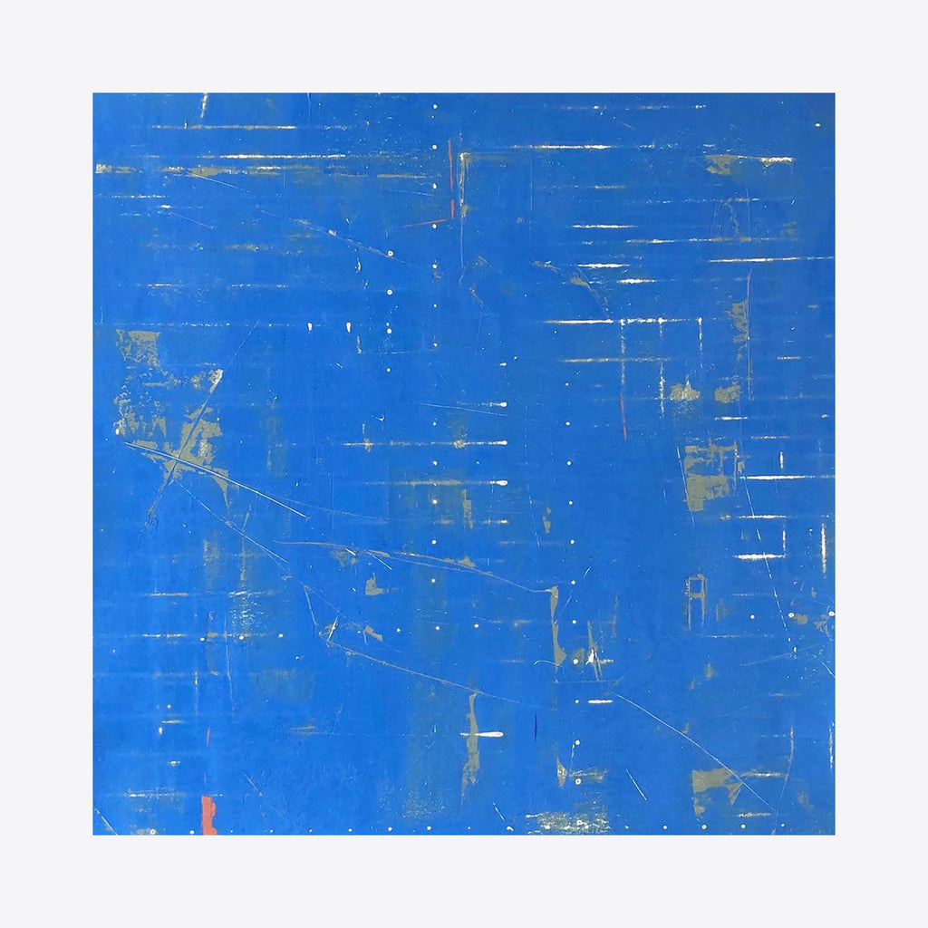 The artwork 'Mostly Blue' by Shira Toren features a vibrant cobalt blue abstract composition with dynamic horizontal scratches and marks in metallic gold tones. The textured surface creates a weathered, contemporary appearance with subtle linear elements and scattered geometric shapes across the 24x24 inch canvas, evoking a sense of movement and depth.