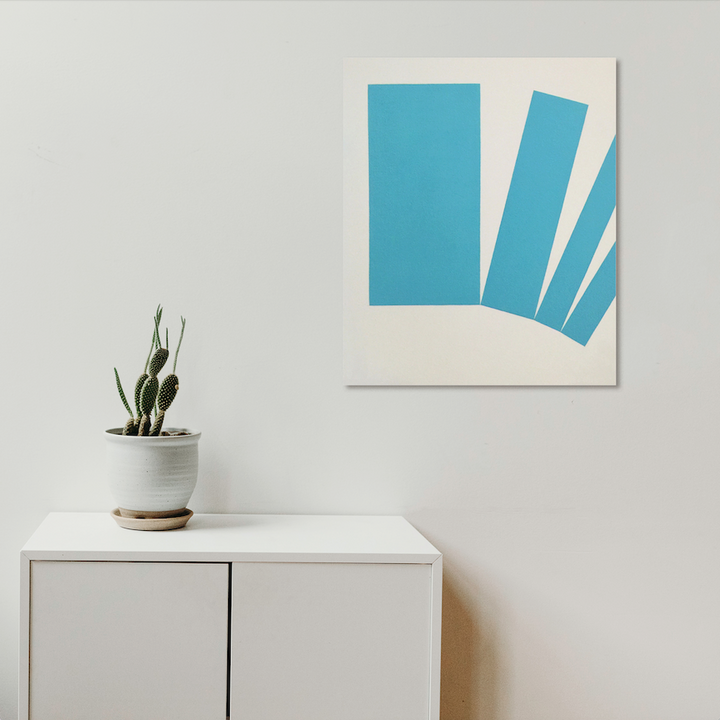 The artwork 'Loss (Diptych)' by Shyun Song features a minimalist geometric composition with vibrant turquoise rectangular shapes arranged asymmetrically against a cream canvas. The abstract design shows four descending bars creating a dynamic visual rhythm on a 36x30 inch oil painting, displayed above a modern white cabinet with a small potted cactus.